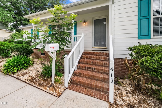 413 S Fayetteville St, Clayton, NC 27520 - property entrance featuring covered porch