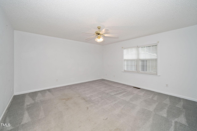 413 S Fayetteville St, Clayton, NC 27520 - carpeted empty room featuring ceiling fan and a textured ceiling