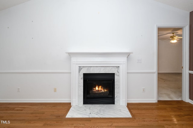 413 S Fayetteville St, Clayton, NC 27520 - detailed view of a fireplace, wood finished floors, and a ceiling fan
