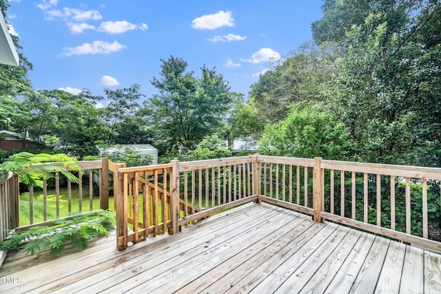413 S Fayetteville St, Clayton, NC 27520 - wooden terrace with view of scattered trees