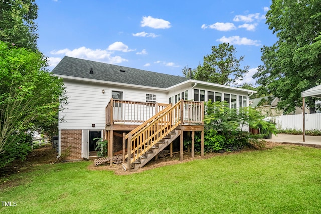 413 S Fayetteville St, Clayton, NC 27520 - rear view of house featuring a wooden deck, stairway, roof with shingles, and a sunroom