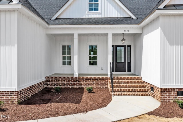 2379 Heartland Rd, Battleboro, NC 27809 - doorway to property with a shingled roof and covered porch
