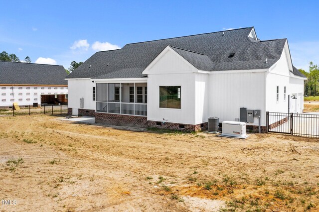 2379 Heartland Rd, Battleboro, NC 27809 - rear view of property with crawl space, a shingled roof, a sunroom, and a fenced backyard