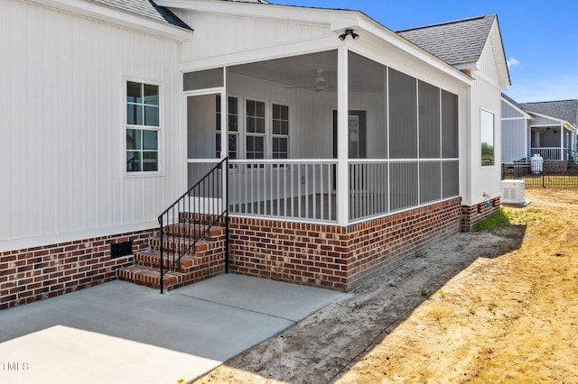 2379 Heartland Rd, Battleboro, NC 27809 - doorway to property featuring roof with shingles, a patio, and crawl space
