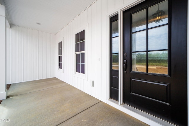 2379 Heartland Rd, Battleboro, NC 27809 - view of exterior entry featuring a porch and board and batten siding