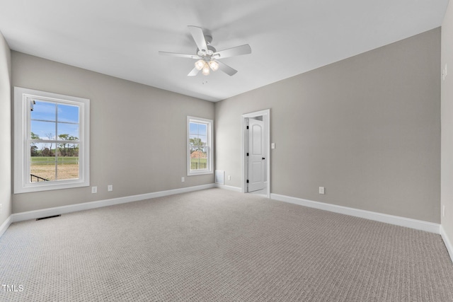 2379 Heartland Rd, Battleboro, NC 27809 - spare room featuring a ceiling fan, carpet floors, and plenty of natural light