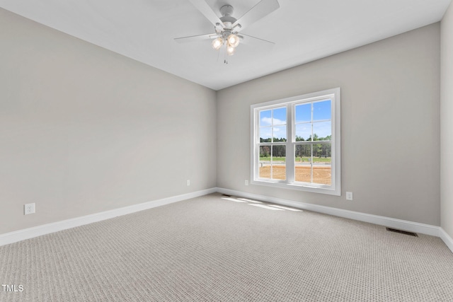 2379 Heartland Rd, Battleboro, NC 27809 - carpeted spare room with baseboards and ceiling fan