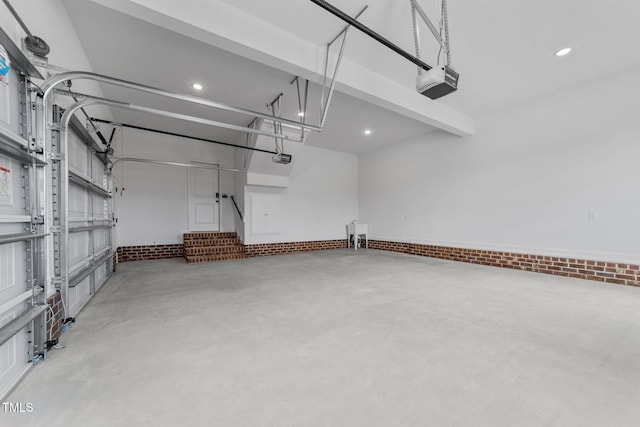 2379 Heartland Rd, Battleboro, NC 27809 - garage featuring a garage door opener and recessed lighting