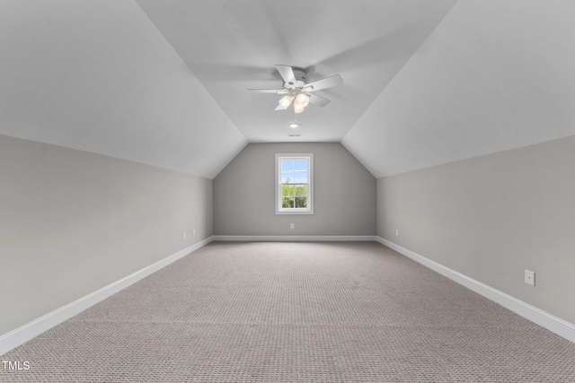 2379 Heartland Rd, Battleboro, NC 27809 - additional living space featuring vaulted ceiling, a ceiling fan, and light carpet
