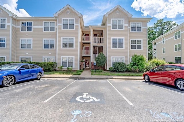 3314 Harbour Pointe Pl Unit 8, Fayetteville, NC 28314 - view of building exterior featuring uncovered parking