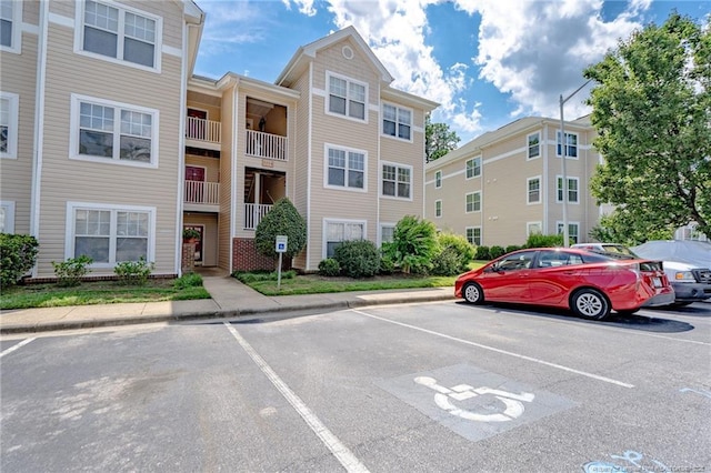 3314 Harbour Pointe Pl Unit 8, Fayetteville, NC 28314 - view of building exterior with uncovered parking