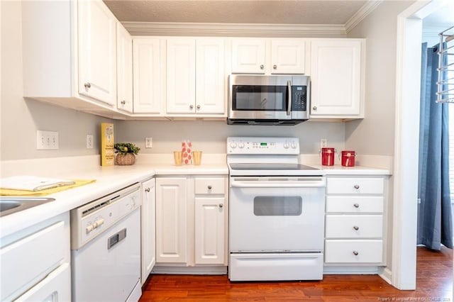 3314 Harbour Pointe Pl Unit 8, Fayetteville, NC 28314 - kitchen with white appliances, ornamental molding, white cabinetry, dark wood-type flooring, and light countertops