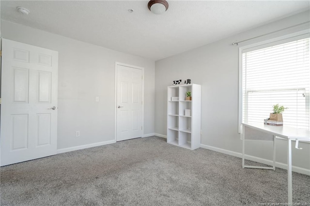 3314 Harbour Pointe Pl Unit 8, Fayetteville, NC 28314 - unfurnished bedroom featuring carpet and a textured ceiling