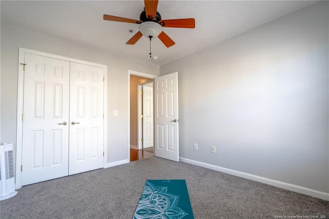 3314 Harbour Pointe Pl Unit 8, Fayetteville, NC 28314 - unfurnished bedroom featuring carpet, a closet, and a ceiling fan