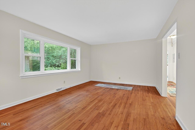 3215 Oxford Dr, Durham, NC 27707 - empty room with light wood-style flooring and baseboards