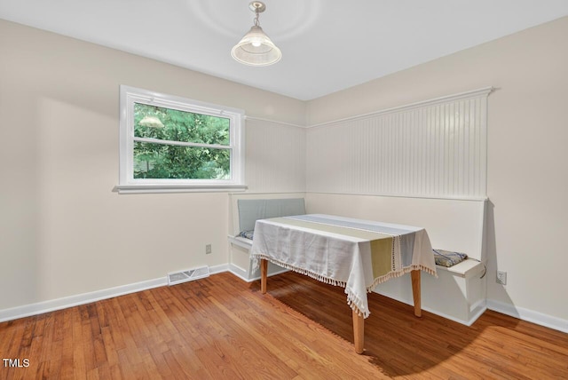 3215 Oxford Dr, Durham, NC 27707 - bedroom featuring wood-type flooring and baseboards