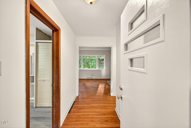 3215 Oxford Dr, Durham, NC 27707 - hall with light wood-style flooring and baseboards