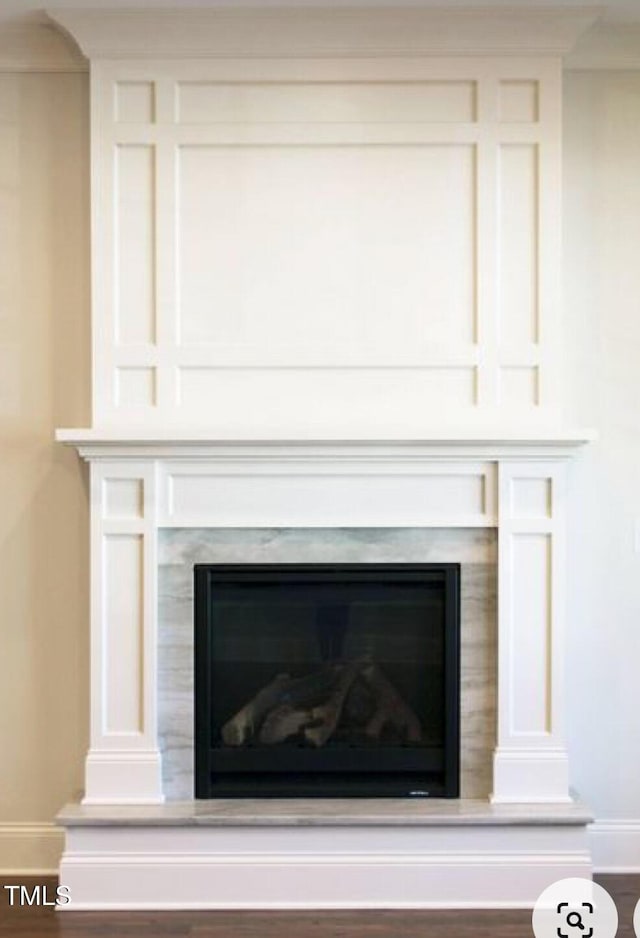 484 Hillard Ln, Wendell, NC 27591 - detailed view of a premium fireplace and baseboards