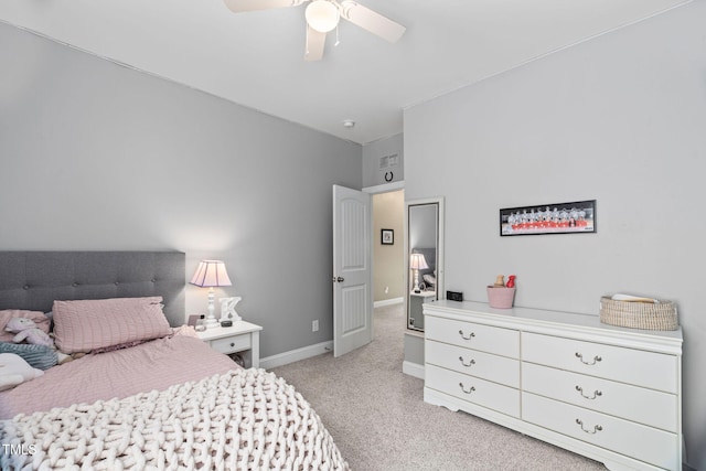 2712 Lake Waccamaw Trl, Apex, NC 27502 - bedroom featuring light carpet and ceiling fan
