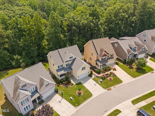 2712 Lake Waccamaw Trl, Apex, NC 27502 - aerial view of residential area with a forest