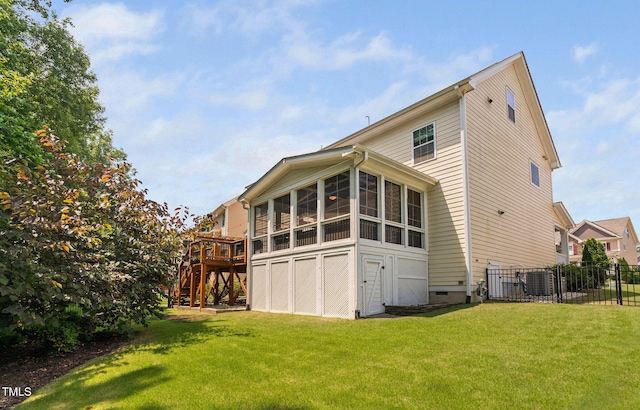 2712 Lake Waccamaw Trl, Apex, NC 27502 - rear view of property featuring crawl space, a sunroom, a deck, and stairs
