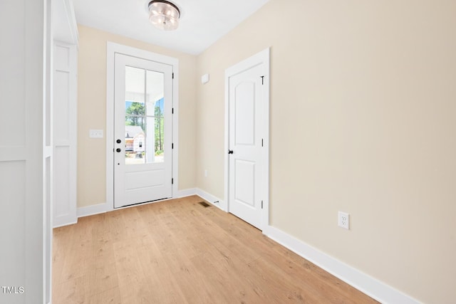 140 Purslane Dr, Franklinton, NC 27525 - entryway featuring light wood-style flooring and baseboards