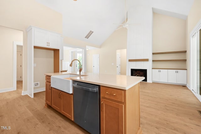 140 Purslane Dr, Franklinton, NC 27525 - kitchen featuring dishwasher, light wood finished floors, a ceiling fan, a fireplace, and high vaulted ceiling