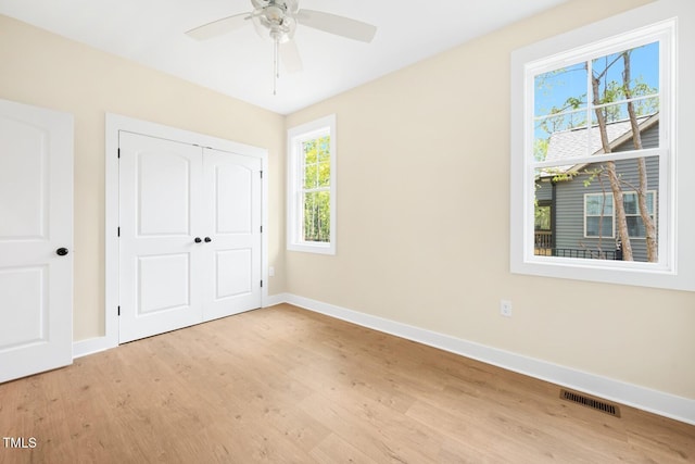 140 Purslane Dr, Franklinton, NC 27525 - unfurnished bedroom featuring light wood-style flooring, a closet, and ceiling fan