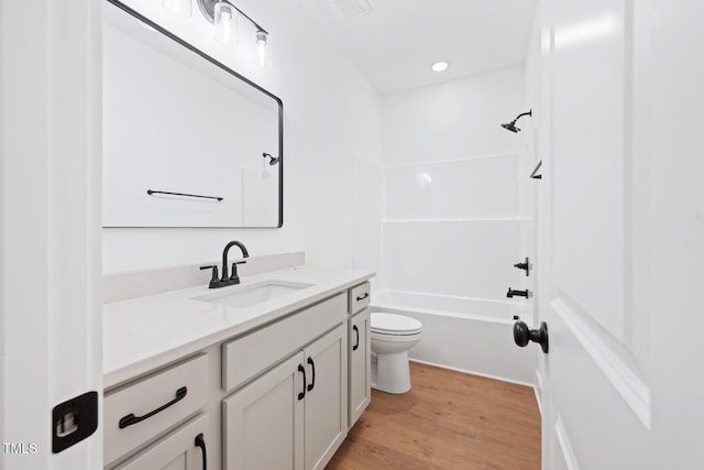 140 Purslane Dr, Franklinton, NC 27525 - full bath with vanity, wood finished floors, and shower / bath combination