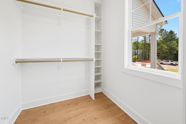 140 Purslane Dr, Franklinton, NC 27525 - spacious closet featuring wood finished floors