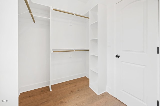 140 Purslane Dr, Franklinton, NC 27525 - walk in closet featuring wood finished floors