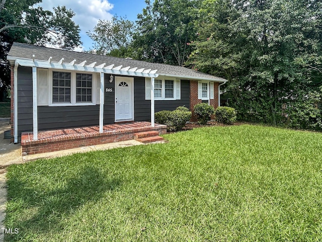 845 Newcombe Rd, Raleigh, NC 27610 - view of front of house featuring a front lawn, a shingled roof, and a pergola