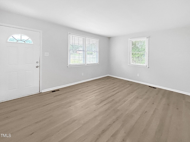 845 Newcombe Rd, Raleigh, NC 27610 - entrance foyer featuring wood finished floors and baseboards