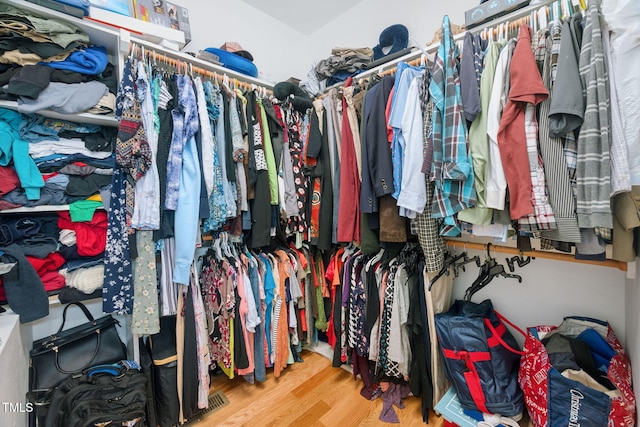 1824 Ferrell Meadows Dr, Zebulon, NC 27597 - spacious closet with wood finished floors