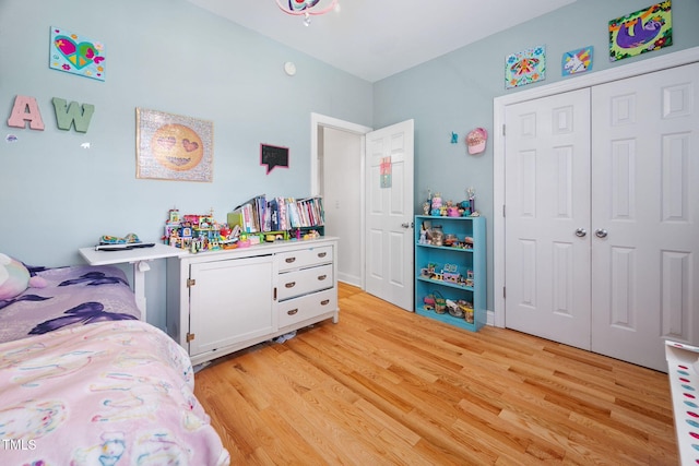 1824 Ferrell Meadows Dr, Zebulon, NC 27597 - bedroom with light wood-type flooring and a closet