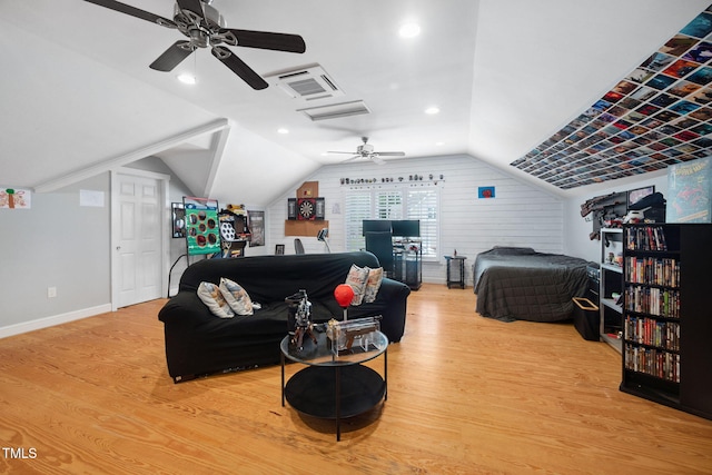 1824 Ferrell Meadows Dr, Zebulon, NC 27597 - bedroom featuring wood finished floors, vaulted ceiling, ceiling fan, and recessed lighting