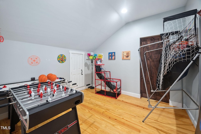 1824 Ferrell Meadows Dr, Zebulon, NC 27597 - game room with vaulted ceiling and wood finished floors