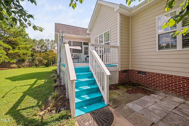 1824 Ferrell Meadows Dr, Zebulon, NC 27597 - doorway to property featuring crawl space and a wooden deck