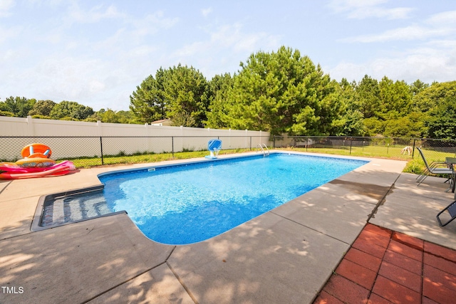 1824 Ferrell Meadows Dr, Zebulon, NC 27597 - view of swimming pool with a patio area