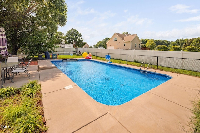 1824 Ferrell Meadows Dr, Zebulon, NC 27597 - view of swimming pool with a patio
