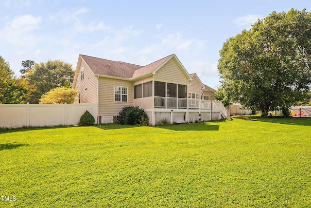 1824 Ferrell Meadows Dr, Zebulon, NC 27597 - rear view of property with a sunroom