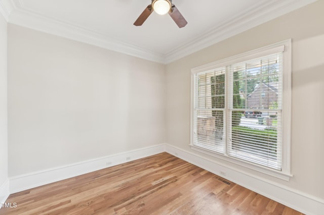 528 Bankhead Dr, Cary, NC 27519 - unfurnished room with ornamental molding, light wood-style floors, and ceiling fan