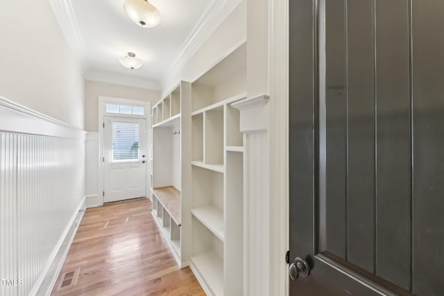 528 Bankhead Dr, Cary, NC 27519 - mudroom featuring ornamental molding, light wood-type flooring, and a wainscoted wall