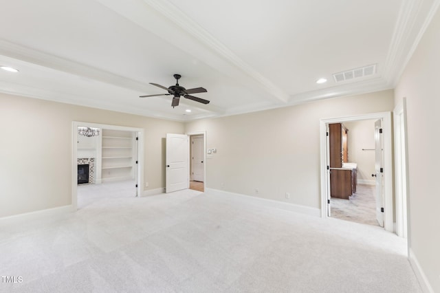 528 Bankhead Dr, Cary, NC 27519 - unfurnished bedroom with crown molding, a tiled fireplace, light carpet, recessed lighting, and a spacious closet