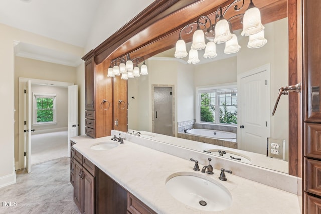 528 Bankhead Dr, Cary, NC 27519 - bathroom featuring plenty of natural light, a garden tub, double vanity, and ornamental molding