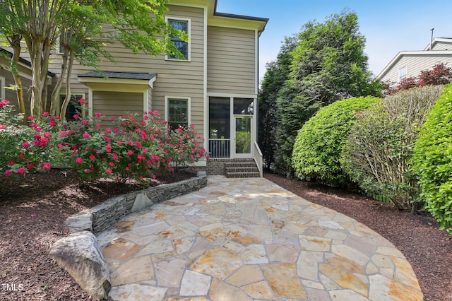 528 Bankhead Dr, Cary, NC 27519 - view of exterior entry featuring a patio area