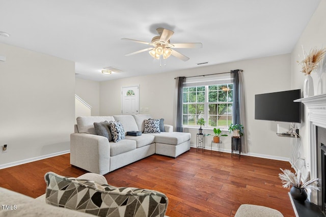 5 Ocean Ct, Durham, NC 27704 - living room featuring a ceiling fan, a fireplace, and wood finished floors