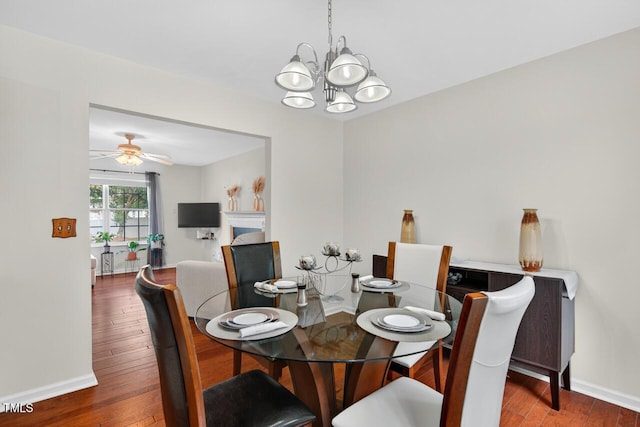 5 Ocean Ct, Durham, NC 27704 - dining area featuring a chandelier, hardwood / wood-style floors, and a ceiling fan