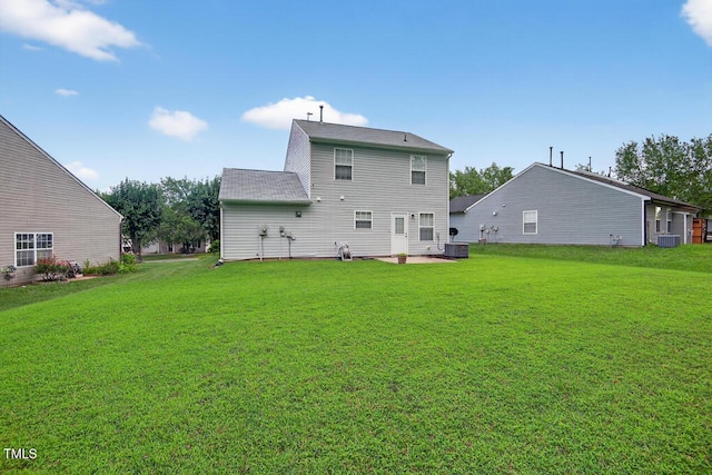 5 Ocean Ct, Durham, NC 27704 - rear view of house with a yard and a patio area
