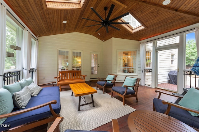 7908 Mayapple Pl, Raleigh, NC 27613 - sunroom featuring a skylight, an outdoor hangout area, wooden ceiling, hardwood / wood-style floors, and a ceiling fan